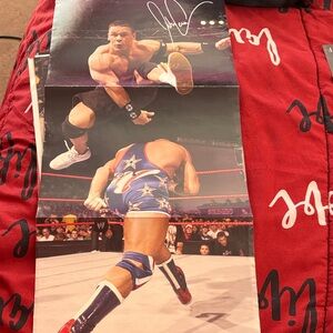 Wwe John cena double sided poster. Has tape on edges from hanging on wall.